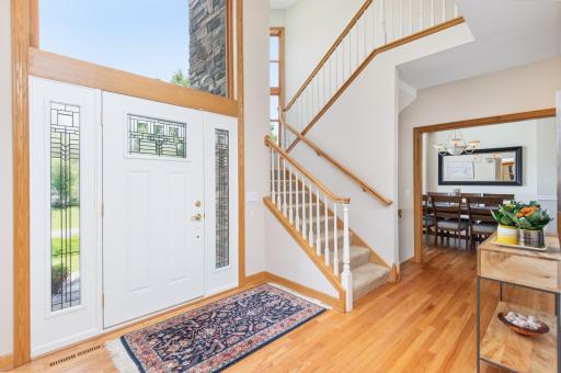 2-story foyer with palladium window & newly refinished hardwood floors.
