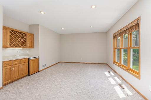 Amusement Room with wet bar & beverage fridge