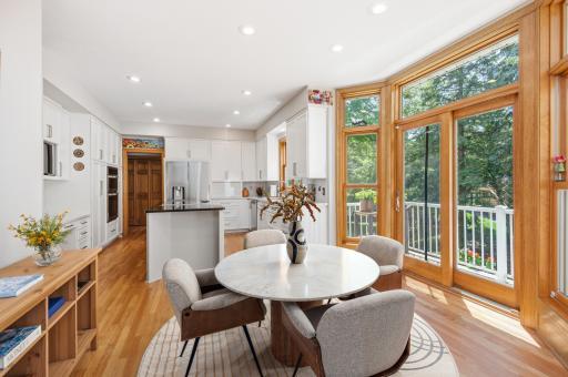 The informal dining area walks out to the deck