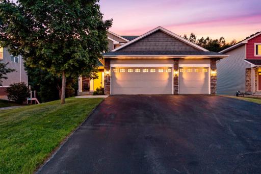 Beautifully maintained home featuring an oversized 3 car garage, inviting front porch, and excellent curb appeal in a desirable Lakeville neighborhood.