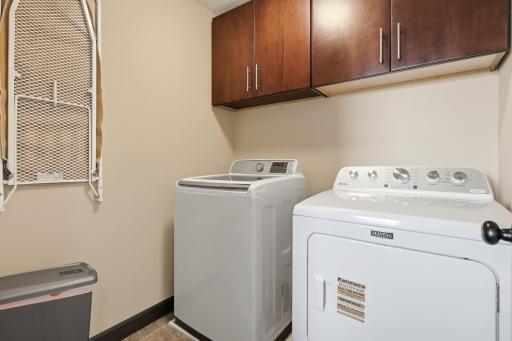 Convenient upper level laundry room located near all three bedrooms, making everyday chores easier and more efficient.