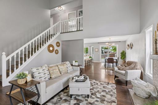 Main floor living space with high ceilings