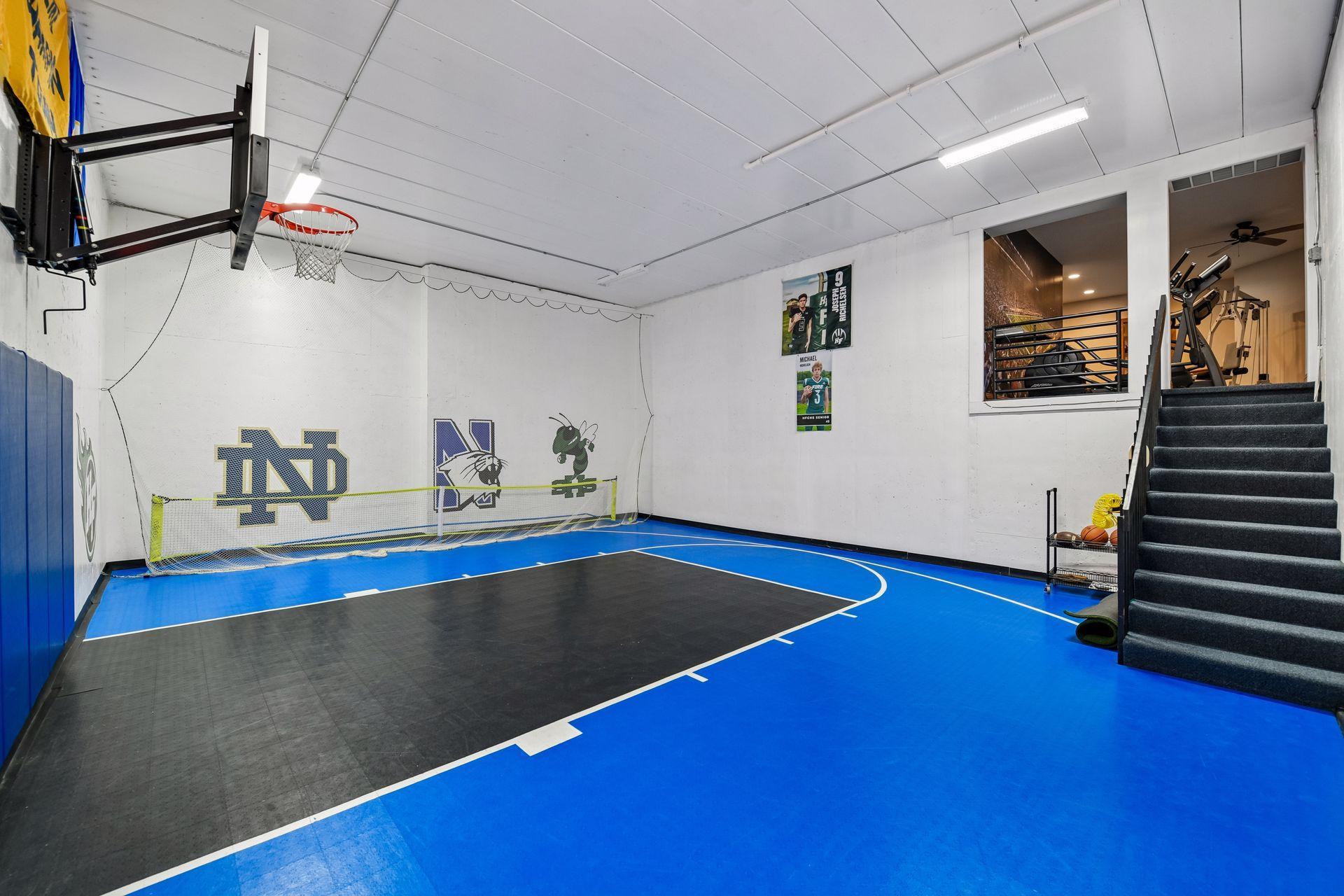 Stairs to upper workout room equipped for home gym or athletes who want to level up all around.