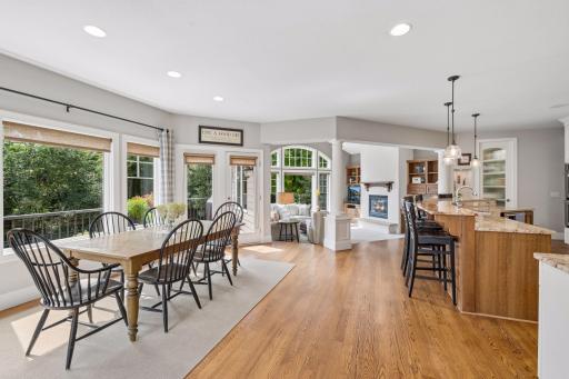Spacious and open informal dining area along with kitchen countertop eating with steps to the hearth room. So many spaces to gather or relax in style.