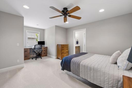 Bedroom three shares a pass-through bathroom to bedroom four in upper level. Built in desk is ideal for homework and studying when needing that quiet space away.