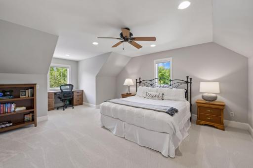 Fourth bedroom with two windows showing the spacious size to accommodate all your needs for space.