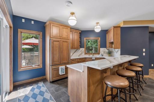 Tiled floor is ideal for bar area to keep things clean as traffic flow will be coming and going from the outdoor pool and backyard entertainers area.