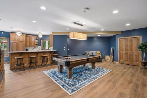Billard room with LARGE walk-in closet and 1/2 bath around corner.