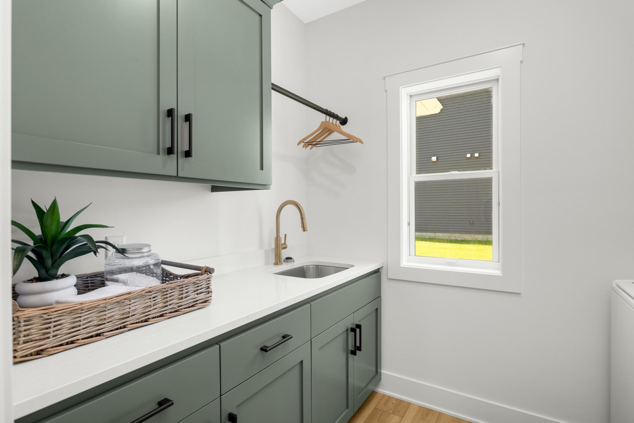 Main Level Laundry Room with sink