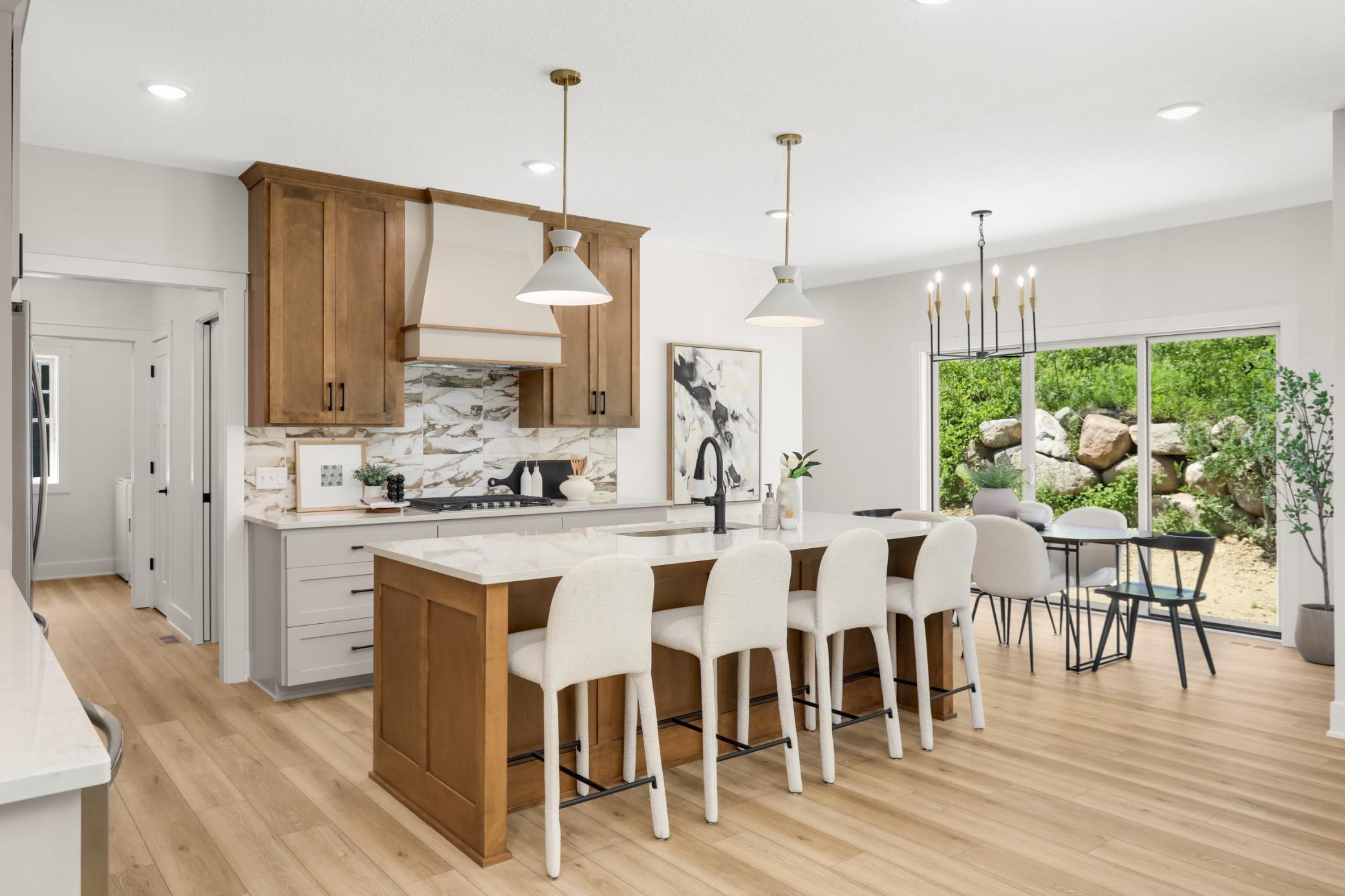 The kitchen opens to the dining room