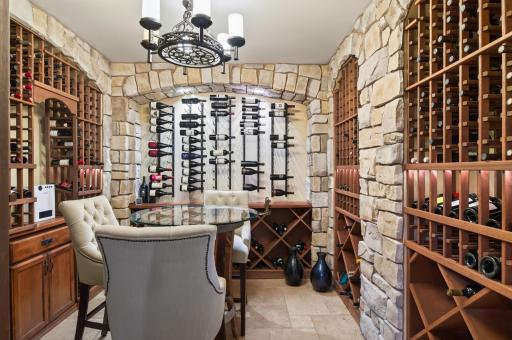 Custom-designed, climate-controlled wine cellar with a remarkable capacity of approximately 2,000 bottles.