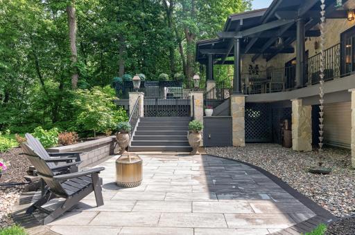 A lower-level extra large paver patio extends the entertaining space even further with French drains added.