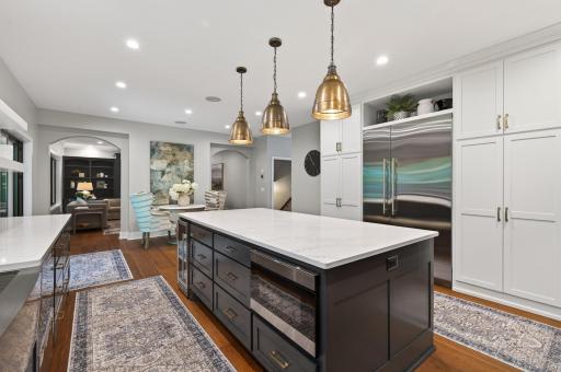 Every detail was considered in this extensive renovation, from the custom cabinetry and designer lighting to the premium appliance package and luxury materials.