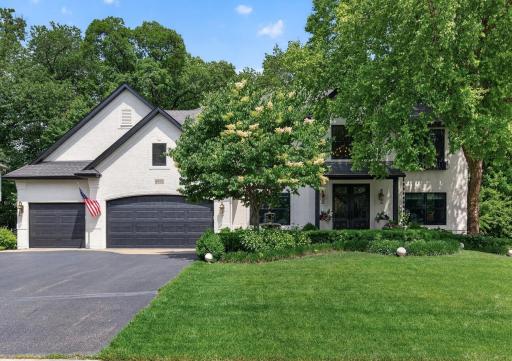 Beautifully updated executive home nestled on a private, wooded lot featuring extensive interior renovations, timeless curb appeal, and exceptional craftsmanship throughout.