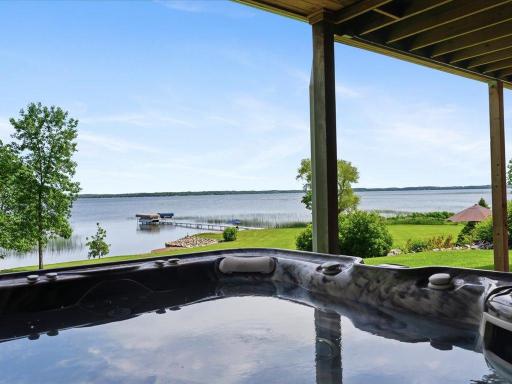 Hot Tub under the covered porch with a priceless view of Lake Lida