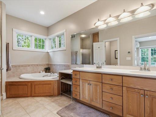 Primary Bathroom with tub and walk in shower