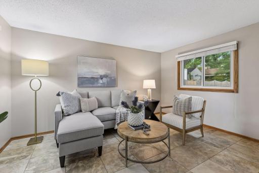 After a long day, settle into this inviting living room designed for comfort and conversation.