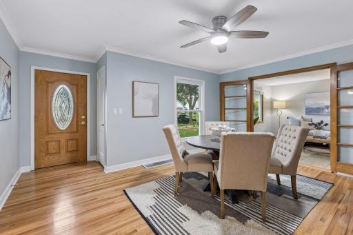 Step inside and you're welcomed by this bright dining area, setting the tone for the home's classic layout.