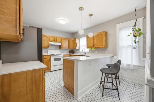 Kitchen featuring brand new quartz countertops.