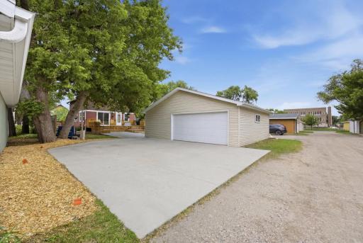 Oversized 2.5 stall garage with plenty of parking and alley access.
