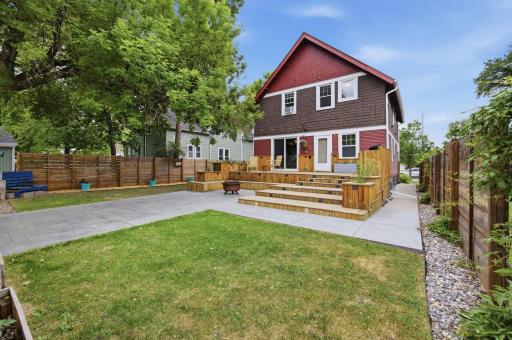 Great Backyard for fun and entertaining with deck and stamped concrete Patio
