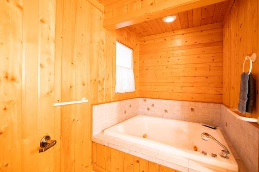 Jetted tub in the main bedroom private bath.