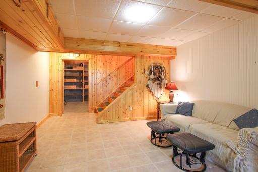 Lower level bonus room is used as a sitting room.
