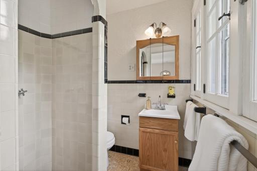 Private ensuite bath serving the primary suite.