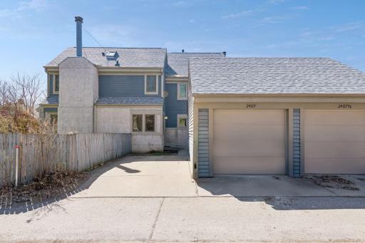One car garage with additional guest parking - alley view