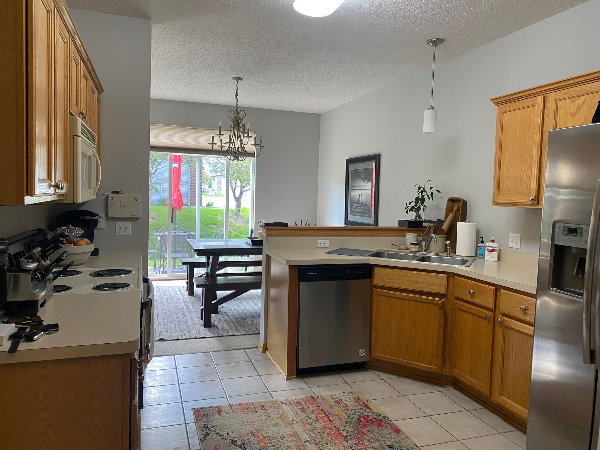 5 Spacious Kitchen with views out to the patio.JPEG