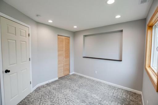 The 3rd bedroom is nice & bright with new carpet, trim & doors.