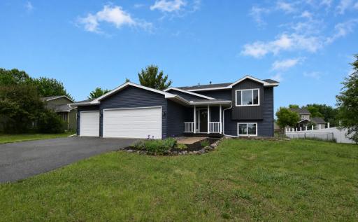 Get ready to move! New siding, garage doors & more!!
