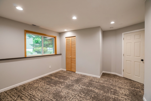 The 4th bedroom also has a nice bright window with new carpet, trim & doors.