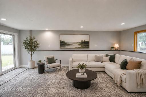 Tons of space in the lower level great room! *photo digitally staged*