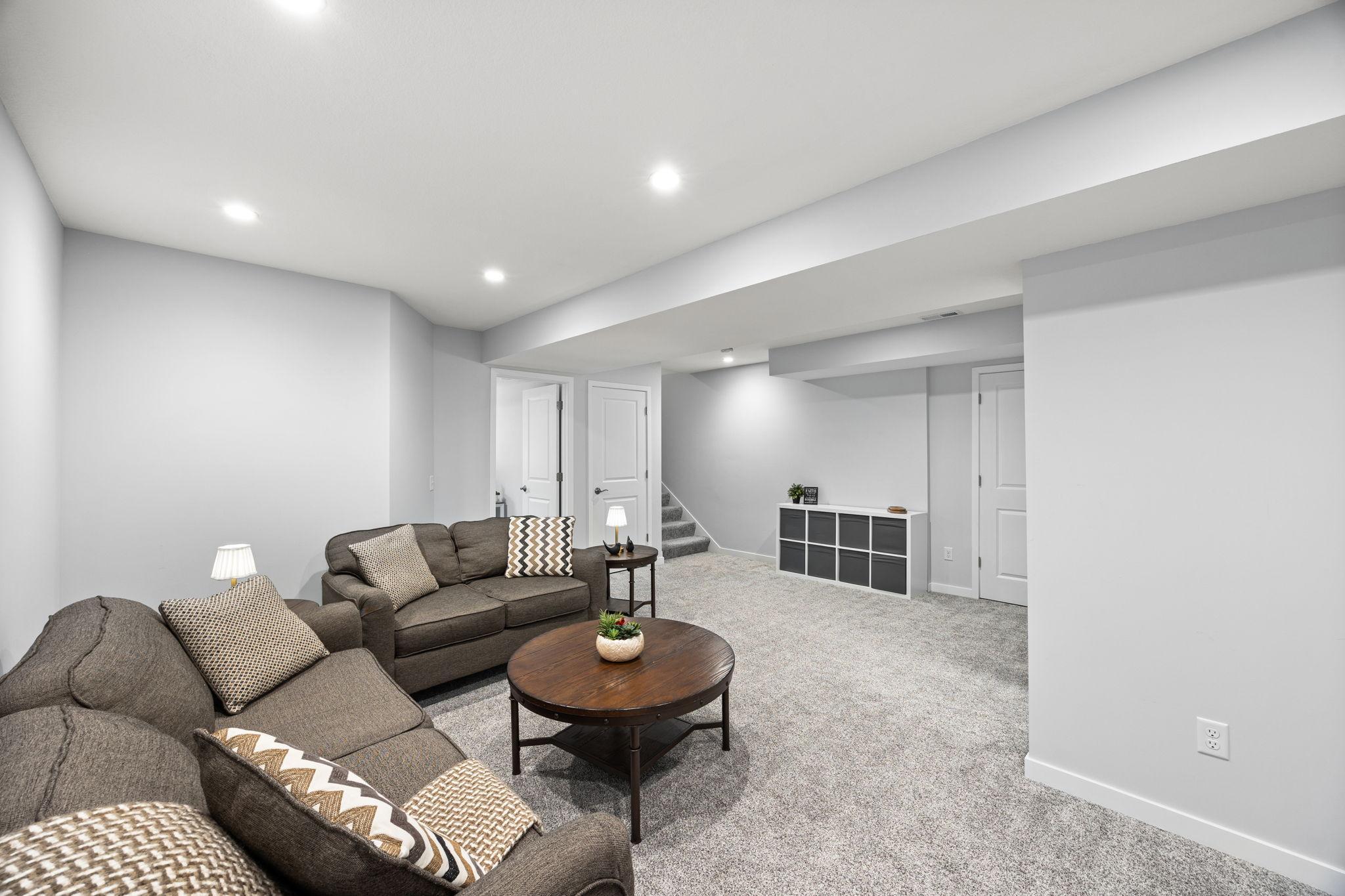 The lower level, finished in 2022, extends the home&rsquo;s living space.