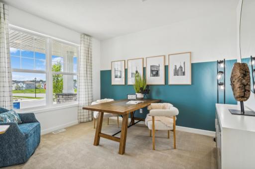 (Photo of model home, finishes will vary) French doors seclude this study from the rest of the first floor, creating an environment ideal for work productivity.