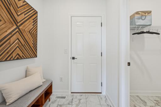 (Photo of model home, finishes will vary) Mudroom on the main floor!