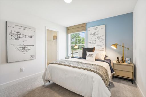 (Photo of model home, finishes will vary) There are three secondary bedrooms on the second floor, offering household members privacy and space to rest.