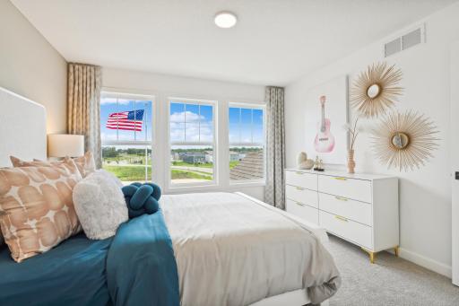 (Photo of model home, finishes will vary) There are three secondary bedrooms on the second floor, offering household members privacy and space to rest.