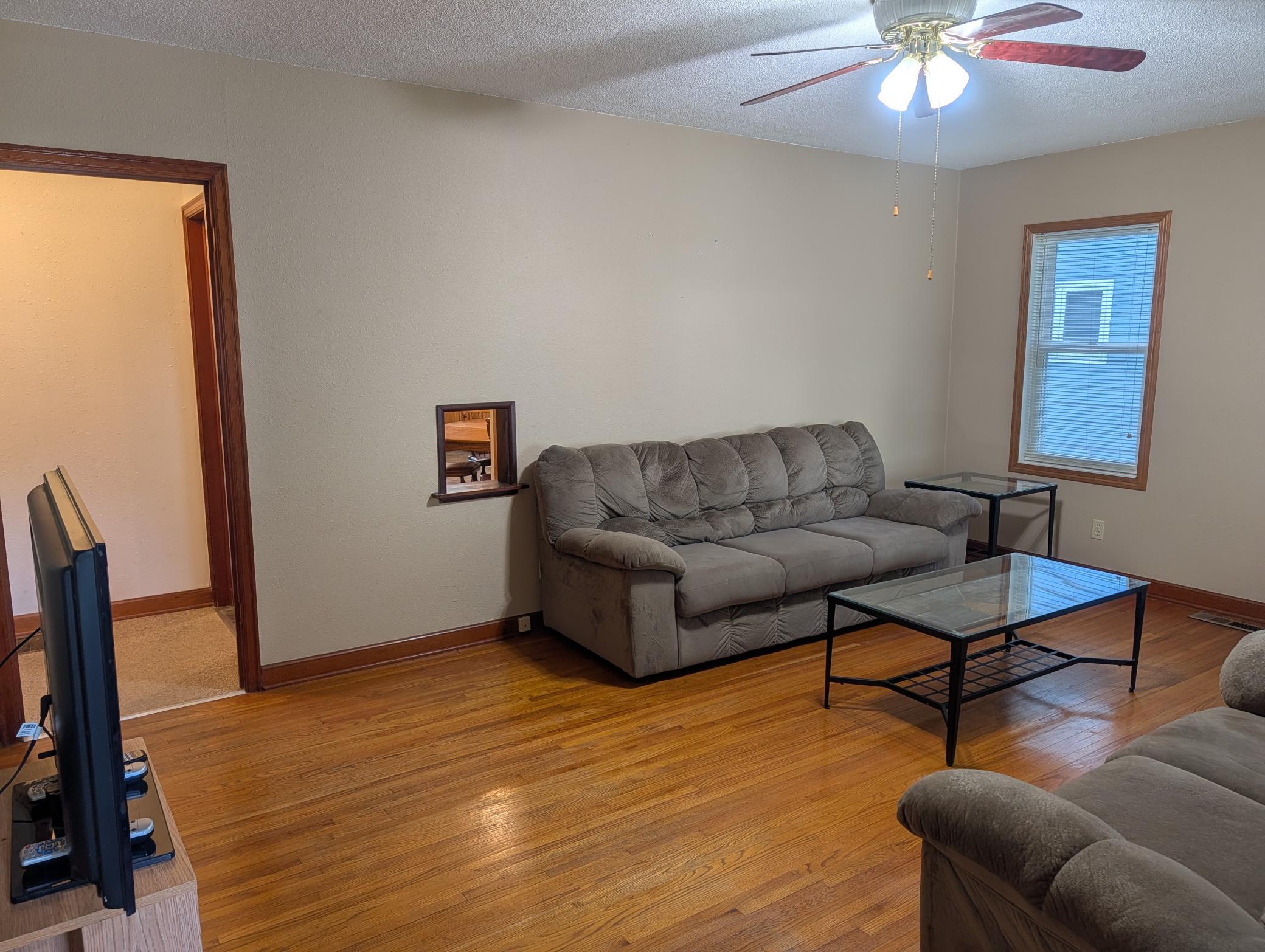 Notice original wood floors