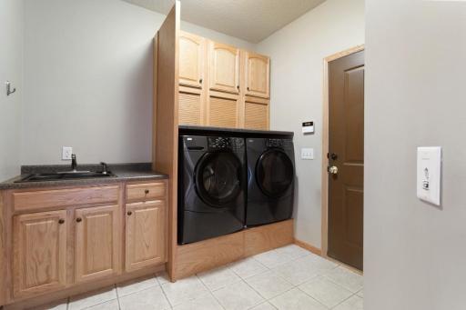 Main level laundry/mud room has a walk in closet