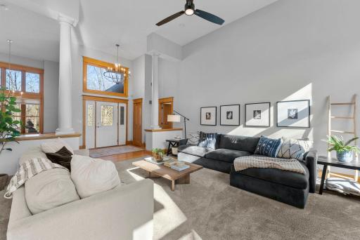 Open sightlines and large windows keep the space feeling connected and inviting.