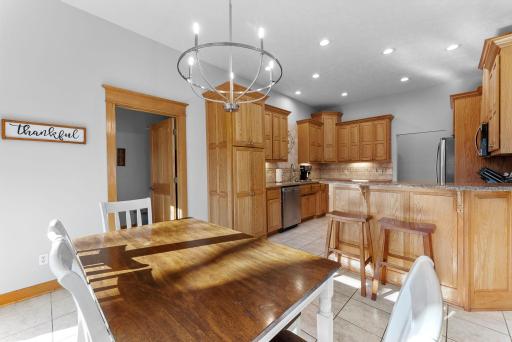 An easy, functional layout that keeps everyone connectedâfrom morning coffee to dinner at home.