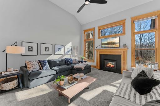 Bright and open, centered around a fireplace that makes it easy to gather year-round.