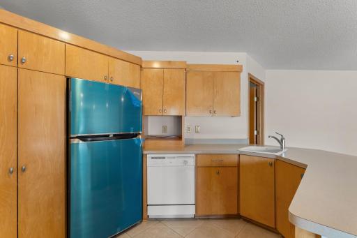 Complete with Functioning Sink, Dishwasher, and New Fridge Never Before Used!