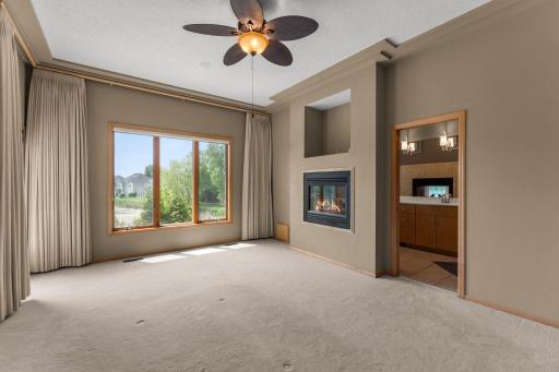 Primary Owner's Suite With a Beautiful 2-Sided Fireplace