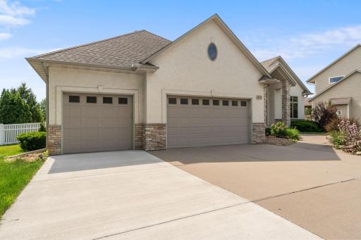 Massive Concrete Driveway and Attached 3-Car Garage