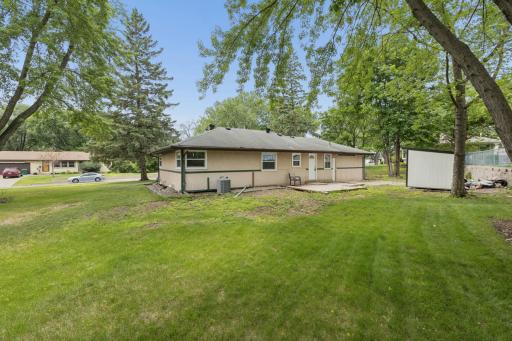 Step outside to discover a private backyard retreat. Whether you're an avid gardener, enjoy hosting summer gatherings, or simply want a peaceful outdoor escape, this spacious yard provides the perfect setting.
