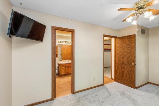 Primary bedroom with walk through to full bathroom