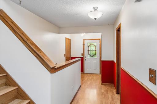 Nice foyer with closet and access to laundry room/garage door.